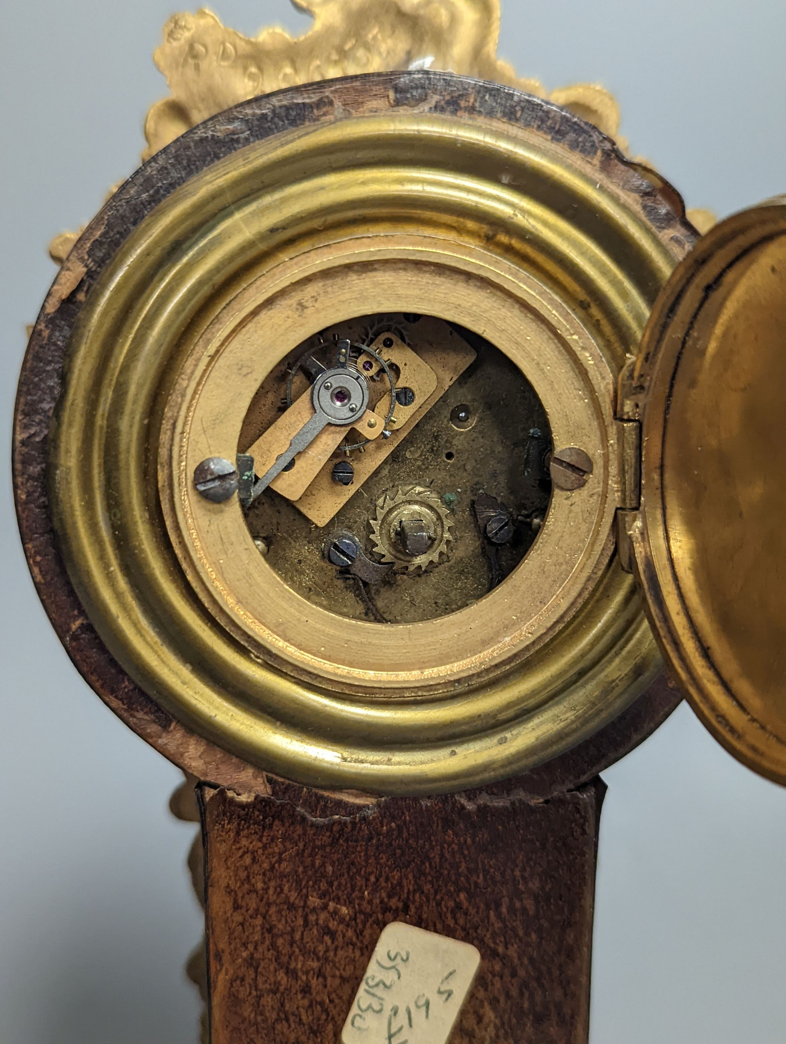 A French timepiece, with paste-set face, in simulated tortoiseshell case, height 25cm